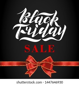 Handwritten modern brush lettering for Black Friday sale on black background with red bow and glitter. Cool logo for banner, flyer, label, poster.