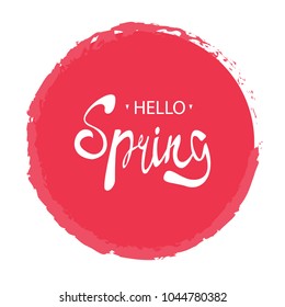 Handwritten phrase Hello Spring with pink circle brush stroke background. Vector illustration.
