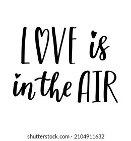 The Handwritten Phrase Love Is In The Air. Hand Lettering. Words On The Theme Of Valentine's Day. Black And White Vector Silhouette Isolated On A White Background