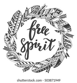 Handwritten quote free spirit with hand drawn graphic ethnic feathers and arrows background. Vector illustration for poster or card design