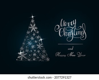 Handwritten silver lettering on a dark blue background. Magic silver Christmas tree of snowflakes. Merry Christmas and Happy New Year 2022.