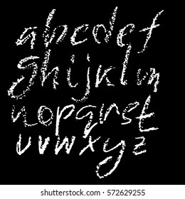 Handwritten vector chalked alphabet. Imitation texture of chalk. Modern hand drawn alphabet. Isolated letters.