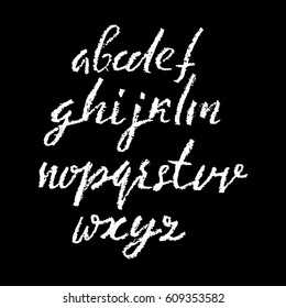 Handwritten vector chalked alphabet. Imitation texture of chalk. Modern hand drawn alphabet. Isolated letters. Vector illustration