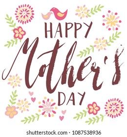 Handwritten vector lettering Happy Mother's day with folk art paper cut style flowers and two small birds ornament isolated on white.