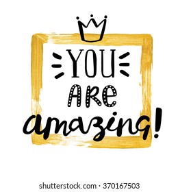 Handwritten "You are amazing" motivation poster with modern calligraphy in hand painted golden frame. 