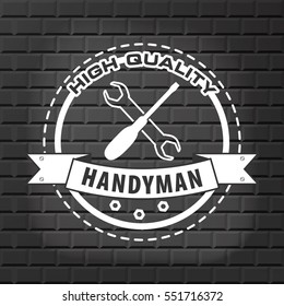 Handyman logo on  brick wall background in grey. Stock vector. Flat design. 