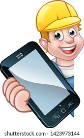 A handyman or mechanic holding a phone with copyspace