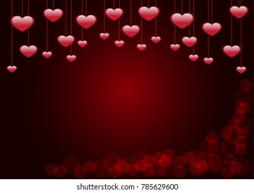 Hang on heart shape on dark red background.