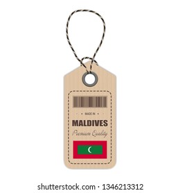 Hang Tag Made In Maldives With Flag Icon Isolated On A White Background. Vector Illustration. Made In Badge. Business Concept. Buy products made in Maldives. Use For Brochures, Printed Materials