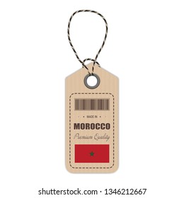 Hang Tag Made In Morocco With Flag Icon Isolated On A White Background. Vector Illustration. Made In Badge. Business Concept. Buy products made in Morocco. Use For Brochures, Printed Materials, Logos