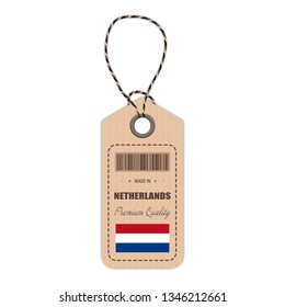 Hang Tag Made In Netherlands With Flag Icon Isolated On A White Background. Vector Illustration. Made In Badge. Business Concept. Buy products made in Netherlands. Use For Brochures, Printed Materials