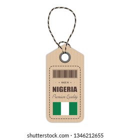 Hang Tag Made In Nigeria With Flag Icon Isolated On A White Background. Vector Illustration. Made In Badge. Business Concept. Buy products made in Nigeria. Use For Brochures, Printed Materials, Logos