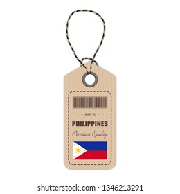 Hang Tag Made In Philippines With Flag Icon Isolated On A White Background. Vector Illustration. Made In Badge. Business Concept. Buy products made in Philippines. Use For Brochures, Printed Materials