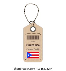 Hang Tag Made In Puerto Rico With Flag Icon Isolated On A White Background. Vector Illustration. Made In Badge. Business Concept. Buy products made in Puerto Rico. Use For Brochures, Printed Materials