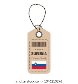 Hang Tag Made In Slovenia With Flag Icon Isolated On A White Background. Vector Illustration. Made In Badge. Business Concept. Buy products made in Slovenia. Use For Brochures, Printed Materials