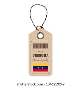 Hang Tag Made In Venezuela With Flag Icon Isolated On A White Background. Vector Illustration. Made In Badge. Business Concept. Buy products made in Venezuela. Use For Brochures, Printed Materials