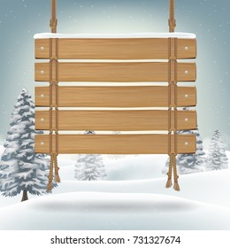 hang wood board with snow winter background