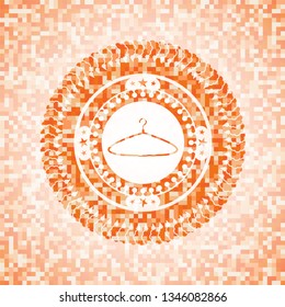 hanger icon inside abstract emblem, orange mosaic background