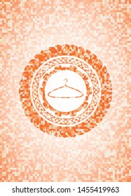 hanger icon inside abstract emblem, orange mosaic background