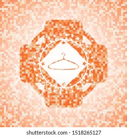 hanger icon inside abstract emblem, orange mosaic background