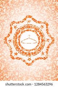 hanger icon inside abstract orange mosaic emblem