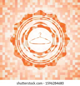 hanger icon inside abstract orange mosaic emblem with background