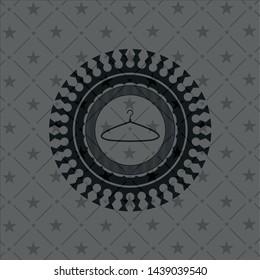 hanger icon inside black badge