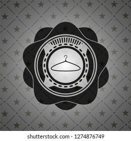 hanger icon inside black emblem