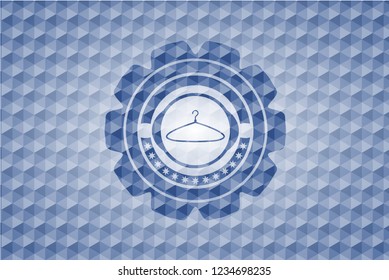 hanger icon inside blue emblem or badge with abstract geometric pattern background.