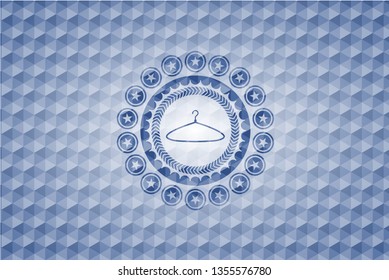 hanger icon inside blue emblem with geometric pattern.
