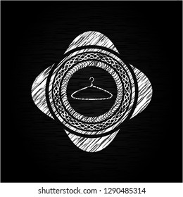 hanger icon inside chalkboard emblem