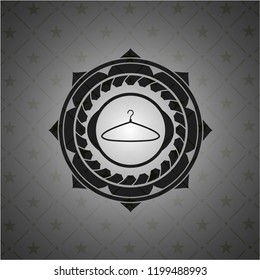 hanger icon inside dark badge or emblem