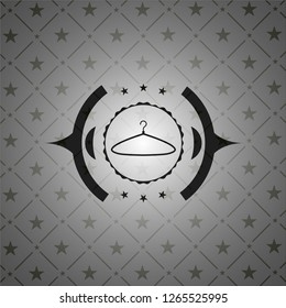 hanger icon inside dark badge or emblem