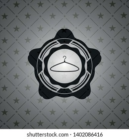 hanger icon inside dark badge or emblem