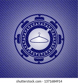 hanger icon inside emblem with denim high quality background