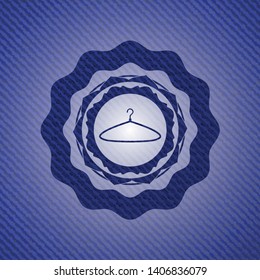 hanger icon inside emblem with jean texture
