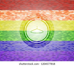 hanger icon inside emblem on mosaic background with the colors of the LGBT flag