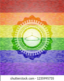 hanger icon inside emblem on mosaic background with the colors of the LGBT flag