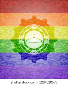 hanger icon inside emblem on mosaic background with the colors of the LGBT flag