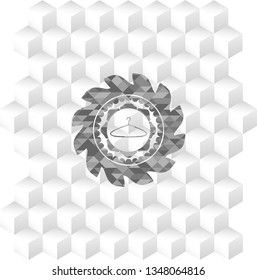 hanger icon inside grey badge with geometric cube white background