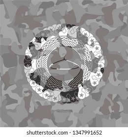 hanger icon inside grey camouflage texture
