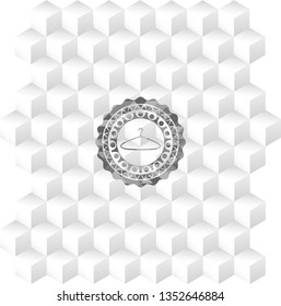 hanger icon inside grey emblem with cube white background