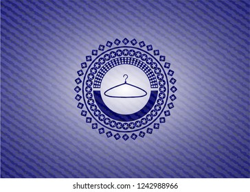 hanger icon inside jean background
