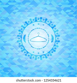 hanger icon inside light blue emblem with mosaic ecological style background