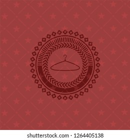 hanger icon inside red emblem