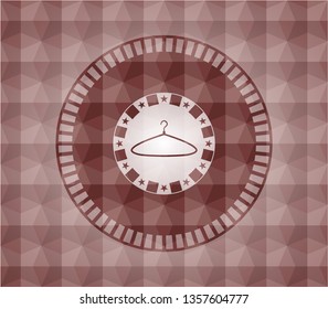 hanger icon inside red emblem with geometric pattern background. Seamless.
