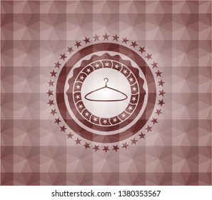 hanger icon inside red emblem or badge with abstract geometric polygonal pattern background. Seamless.