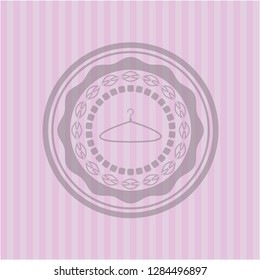 hanger icon inside retro pink emblem