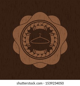 hanger icon inside retro style wooden emblem