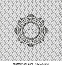 hanger icon inside shiny silver emblem. Scales pattern. Vector Illustration. Detailed. 